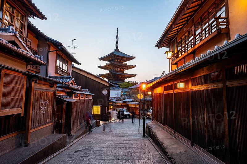 Yasaka dori historic street in the old town with traditional Japanese houses, five-story Yasaka Pagoda of the Buddhist Hokanji Temple at the back, evening mood, blue hour, Higashiyama, Kyoto, Japan