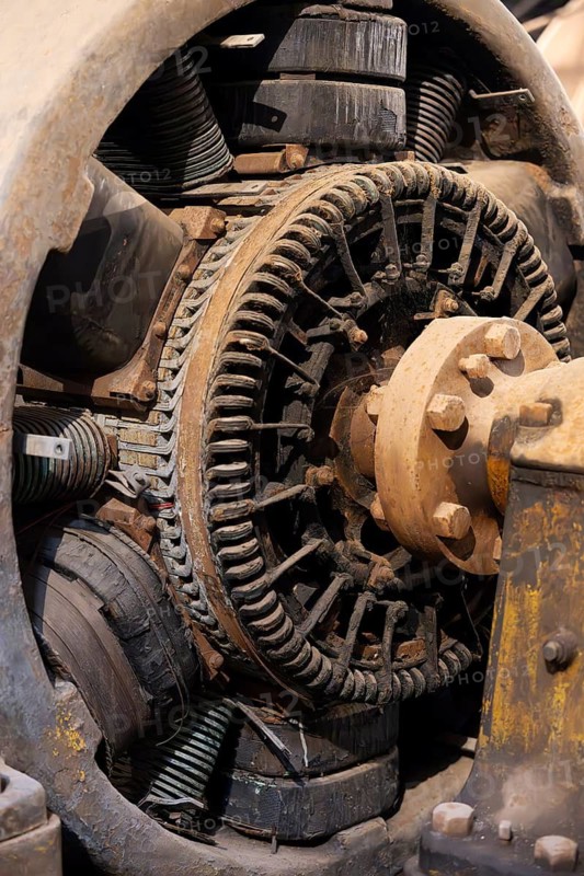 Old generator with rotor, copper windings and coupling flange, detailed view of a historic industrial machine, Fray Bentos, Rio Negro, Uruguay