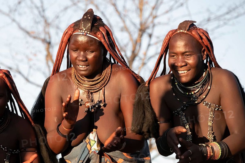 Himba woman dancing euphorically, traditional dance, traditional Himba village, Kaokoveld, Kunene, Namibia