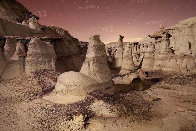 While visiting the Bisti National Wilderness in New Mexico, USA, I set myself the goal of making a photo that looked as if it had been taken on another planet. After using GPS to hike in to this area, I scouted for a composition and then set up for a long exposure to capture this image of the hoodoo rock formations left over from an ancient sea. It truly was an amazing experience! Canon 5D II, Rokinon 24 mm lens, Induro tripod and ballhead, f/11, 15 minutes, ISO 800