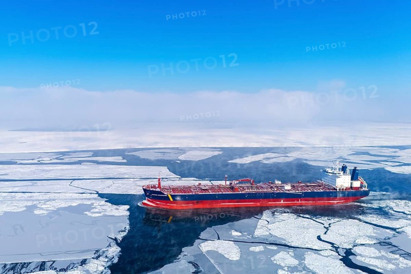 LNG carrier going up the frozen St. Lawrence River, Region of Center Quebec, Province of Quebec, Canada