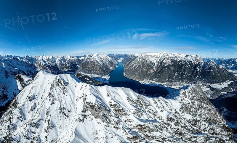 Aerial view, epic view of mountain landscape with snow in winter, summit of Bärenkopf, Achensee, Tyrol, Austria