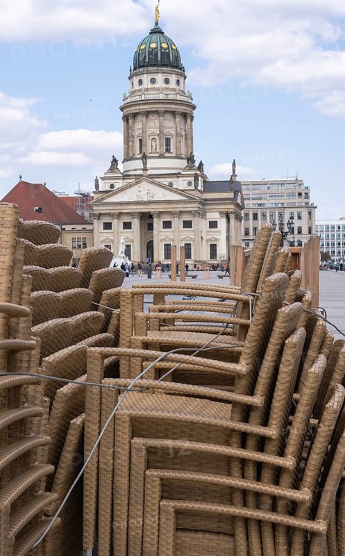 Stacked up chairs from local restaurants on the Gendarmenmarkt, Berlin, Germany