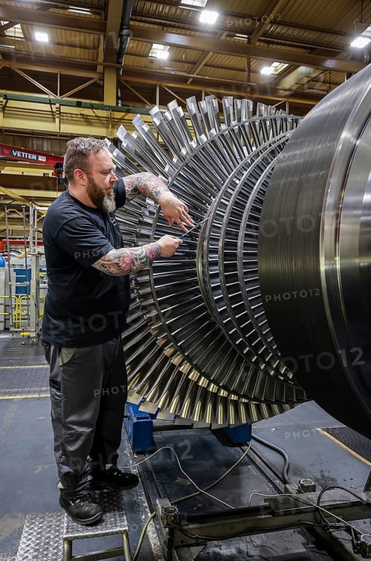 Oberhausen, North Rhine-Westphalia, Germany, MAN Energy Solutions is a long-established company in the Ruhr region. Industrial mechanic works on a steam turbine. MAN Energy Solutions is the world market leader in propulsion engines for ships and engines for power generation, as well as turbomachinery for stationary applications such as in gas networks, in the process industry and also for power generation. Note: The person pictured has given their verbal consent for publication in the press