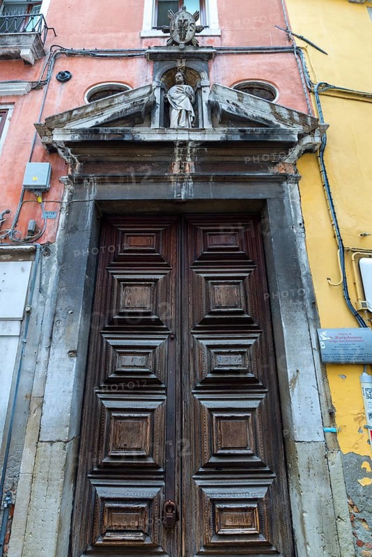 Entrance portal of St. Bartolomeo Church, 17th century, Venice, Veneto, Italy