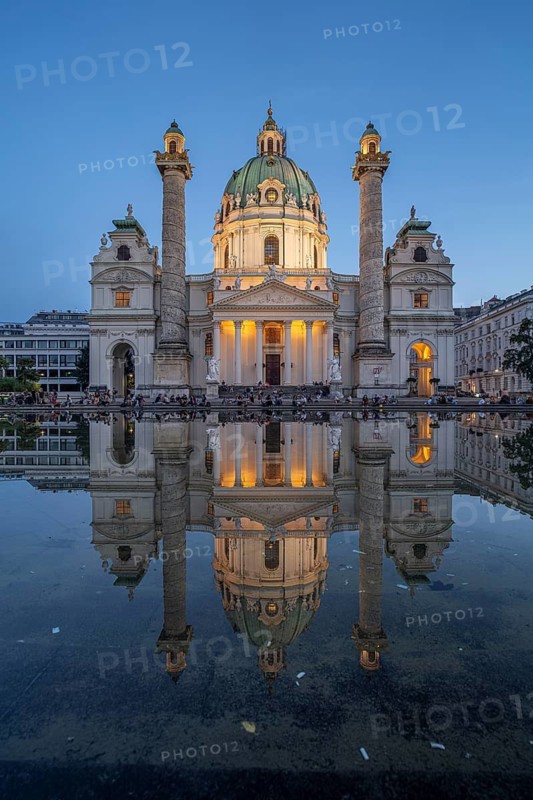 The baroque Karlskirche church at dusk, Vienna, Austria