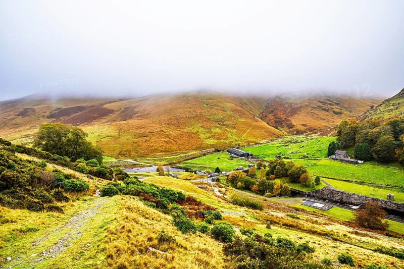 Autumn colors over Claerwen Dam, Claerwen Valley, Elan Valley Reservoir, Rhayader, Powys, Wales, UK