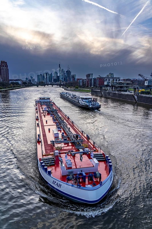Skyline of Frankfurt am Main, skyscrapers, business and banking district in the city centre, cargo ships, tankers, on the Main, Hesse, Germany