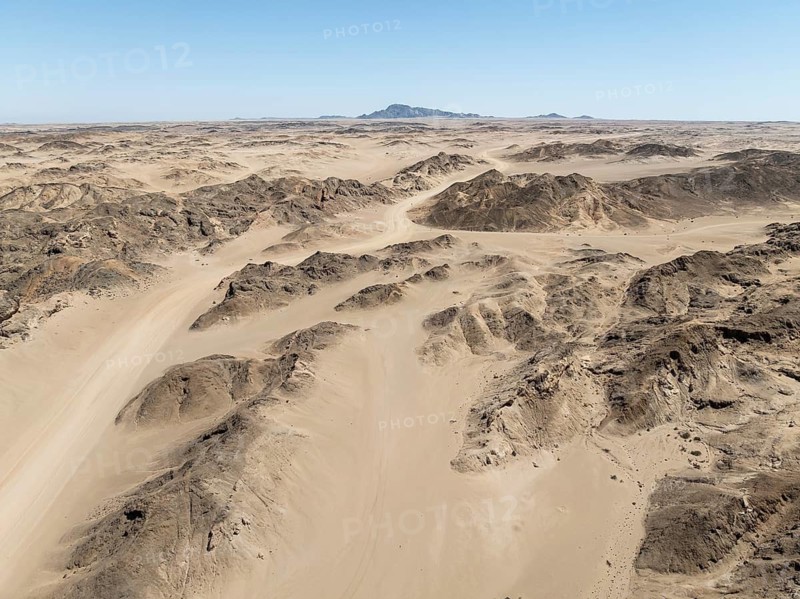 Aerial view, dry barren mountains in Moon Valley, rocky landscape ridged by erosion, Namib-Naukluft Park, Namib Desert, Namibia