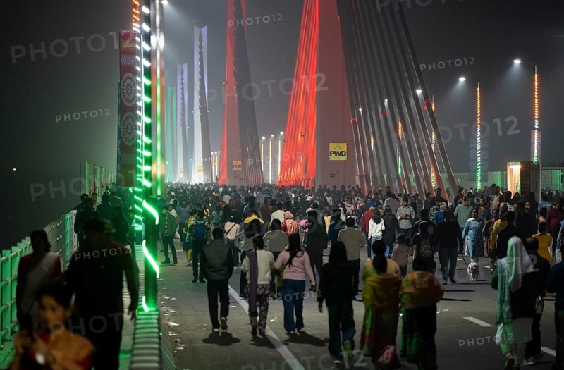 People gather on the newly inaugurated Kumar Bhaskar Varma Setu, a six-lane cable styled bridge over the Brahmaputra River, in Guwahati, India on 15 February 2026
