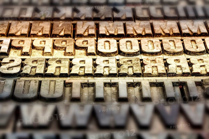 Hot metal printing setting, old letters made of lead for letterpress printing, Lettern aus dem Buchdruck, Bleisatz