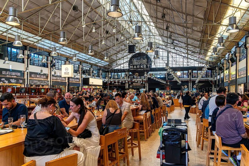 The Mercadeo da Ribeira, also known as TimeOut Market, is the best address for Portuguese specialties and international cuisine. Historic market hall at Cais do Sodré station, Lisbon, Portugal
