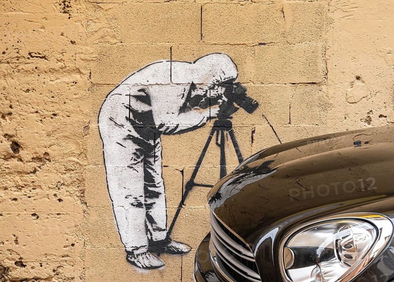 Artistic graffiti on a house wall in Carrer de Sant Pere, Palma de Majorca, Spain