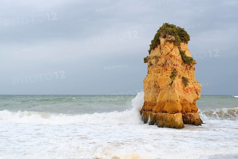 Rocks on the coast in the surf, Praia Dona Ana, Lagos, Algarve, Portugal