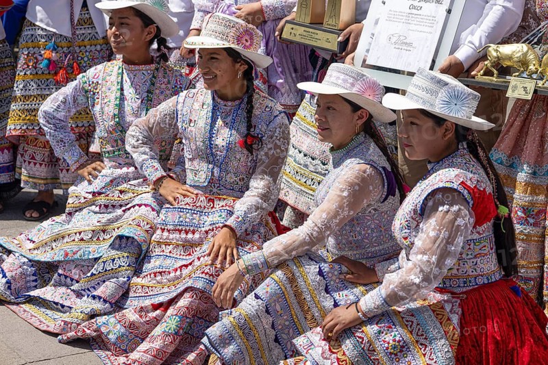 Arequipa, Peru, 2 February, 2026: Native indigenous people of Peru in National costumes perform dances and take images with people in Plaza de Armas in Arequipa, Peru