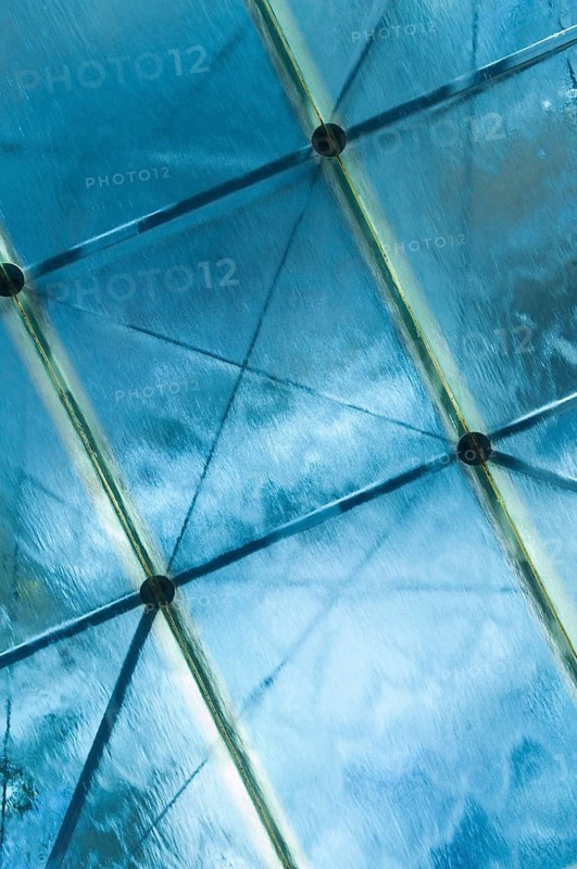 Water flows over glass surface
