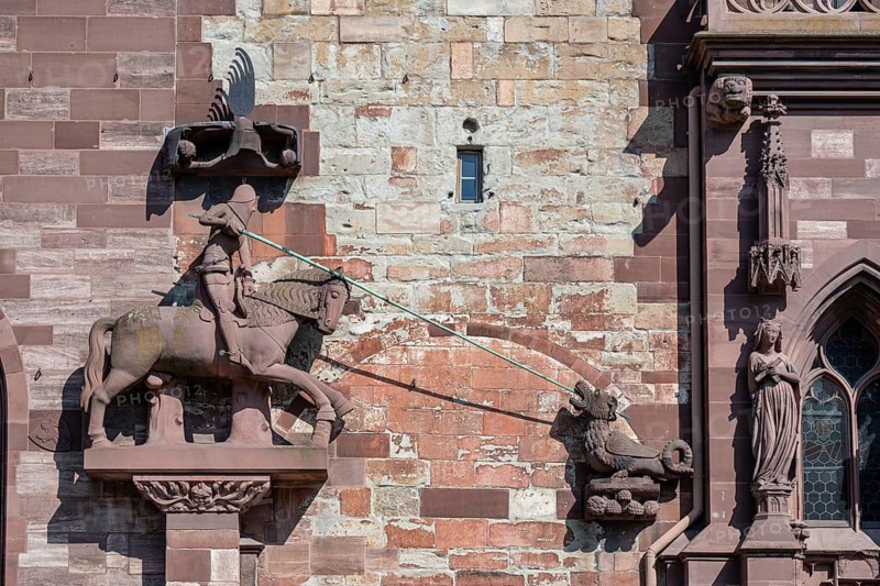 Statue of Saint George as a dragon slayer on the façade of Basel Cathedral, Altstadt, Basel, Canton of Basel-Stadt, Switzerland