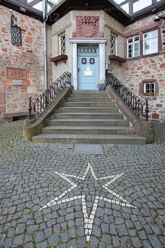 Staircase and entrance to the Schwalm Museum, stone house, half-timbered house, pentagonal star as floor mosaic, goat grove, Schwalmstadt, Hesse, Germany
