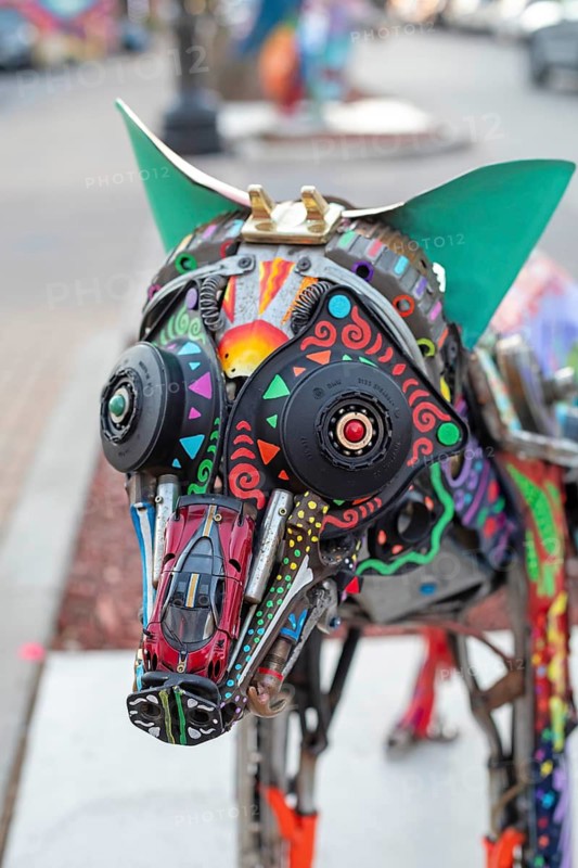 Detroit, Michigan - Alebrijes, or Mexican sculptures of mythical creatures, are on display in Detroit's Mexicantown neighborhood. The sculptures are made from car parts by artist Elton Monroy Duran.