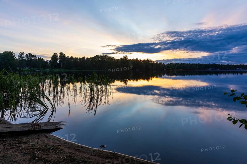 Quiet evening mood at the lake at sunset on Lake Hinden near Värnamo, Jönköpings län, Sweden