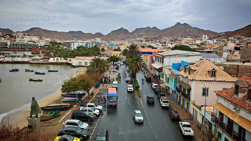 Busy city street along the coast with cars and palm trees, surrounded by mountains, view from Torre de Belem, Mindelo, Sao Vicente, Cabo Verde, Cape Verde, Cape Verde