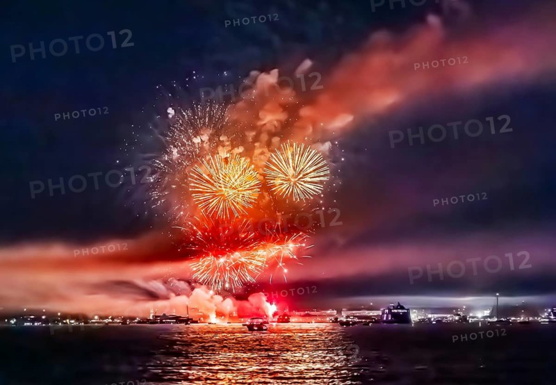 Lake Night Festival Constance. Water fireworks over the German shore and the neighbouring Swiss town of Kreuzlingen. View of the fireworks from Lake Constance. Constance, Baden-Württemberg, Germany