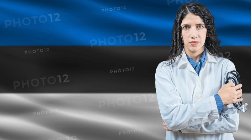 Estonian national health system, Medical professional on Estonia flag background