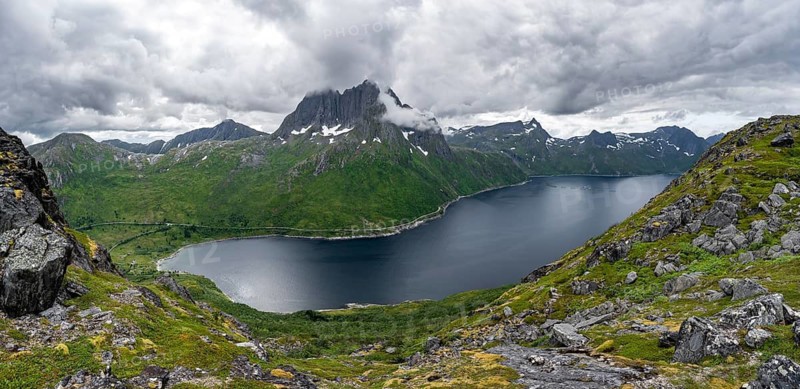 View of Mefjorden fjord from Barden mountain, Breidtind mountain peak behind, Senja, Norway