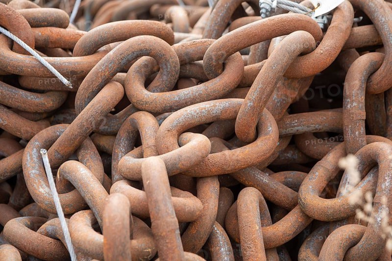 Detroit, Michigan - Heavy mooring chain at a U.S. Coast Guard station on the Detroit River, stored during winter. During the shipping season, the chains are used to anchor navigation buoys