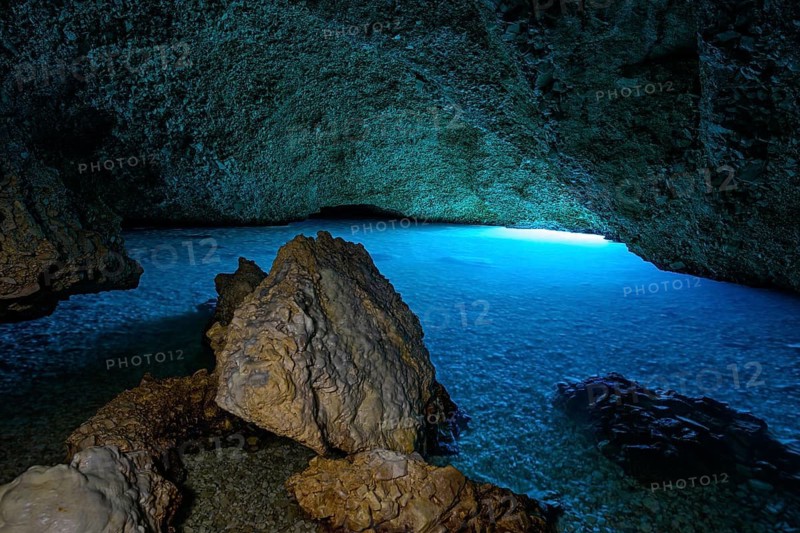 Plava Grotta, cave with bright blue water created by sunlight falling under water. Croatia, Europe, Blue Cave, Croatia