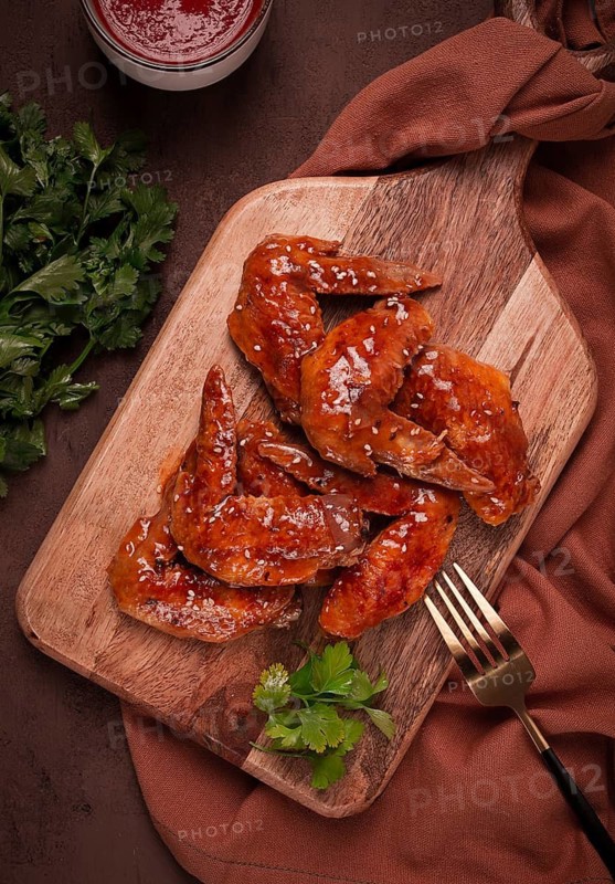 Chicken wings, with barbecue sauce, with tomato sauce, fast food, no people