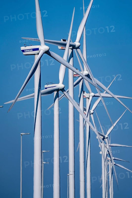 Wind farm on the Nordzeeweg, on a long spit of land between the Maas and the Calandkanaal in the Europoort harbour of Rotterdam, Netherlands