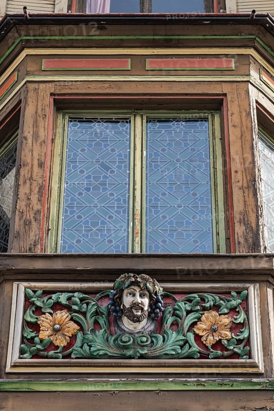 Detailed view of the former Gasthaus zum goldenen Becher in the historic old town of Rottweil, which was already mentioned as an inn in 1713. The wooden bay window was artfully decorated by the well-known German sculptor and mask carver German Burry, Rottweil district, Baden-Württemberg, Germany