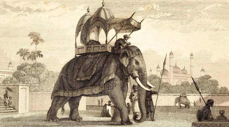 Tied elephant in park, India, outdoors, ceiling, rider, covered seat, tamed wild animal, animal protection, farm animal, transportation, spears, men, palace in background, architecture, building, steel engraving, historical illustration 1834
