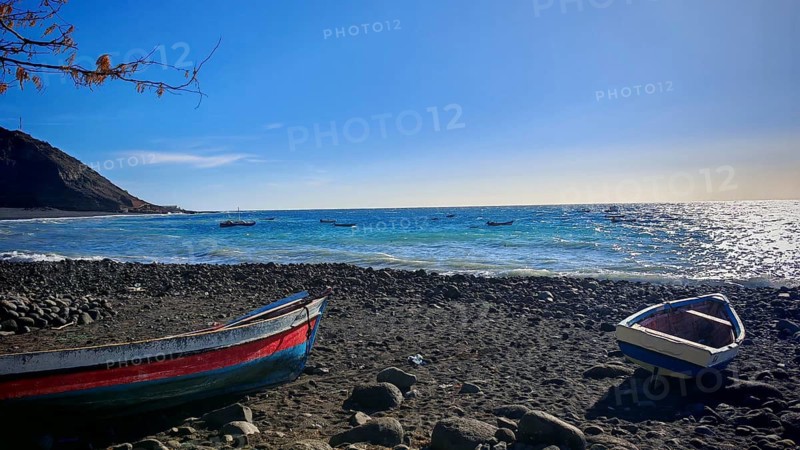 Small rocky beach with fishing boats, bright blue sky and sea, hiking, Tarrafal de Monte Trigo, Santo Antao, Cabo Verde, Cape Verde, Cape Verde