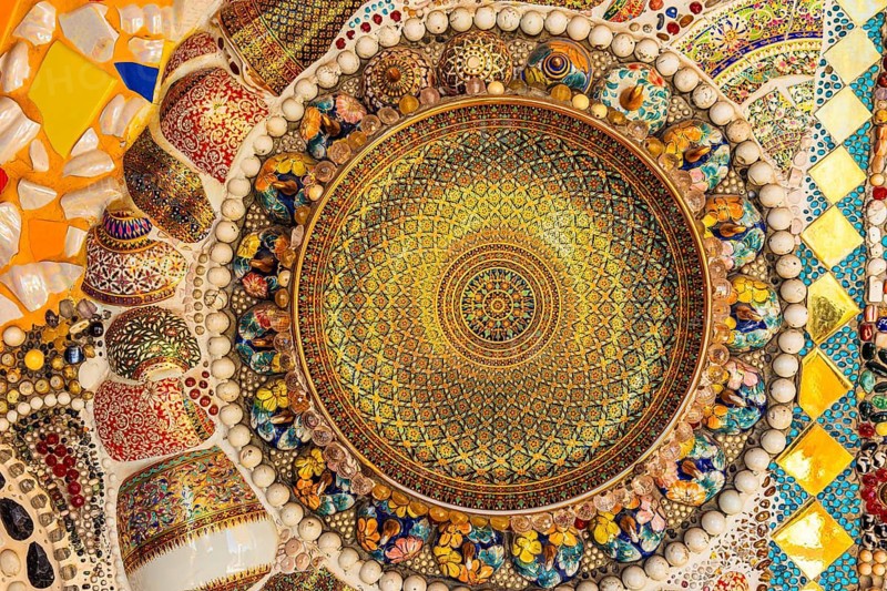 Wall covering with colorful mosaic tiles and incorporated bowls, Buddhist temple complex Wat Phra That Sorn Kaew, Phetchabun province, Thailand