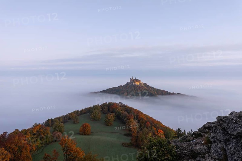 Hohenzollern Castle in a sea of fog at sunrise, autumn in the Swabian Jura