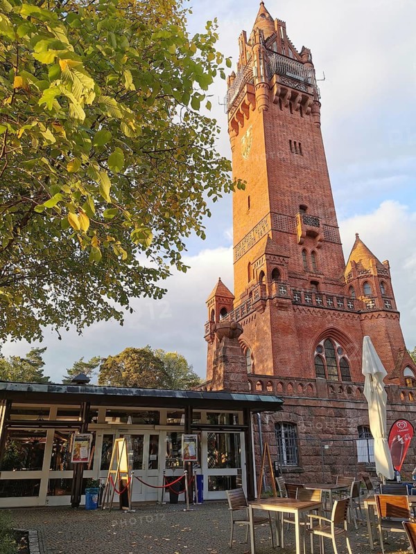 Grunewald Tower, brick tower next to a café under autumn-colored trees, Grunewald, Berlin