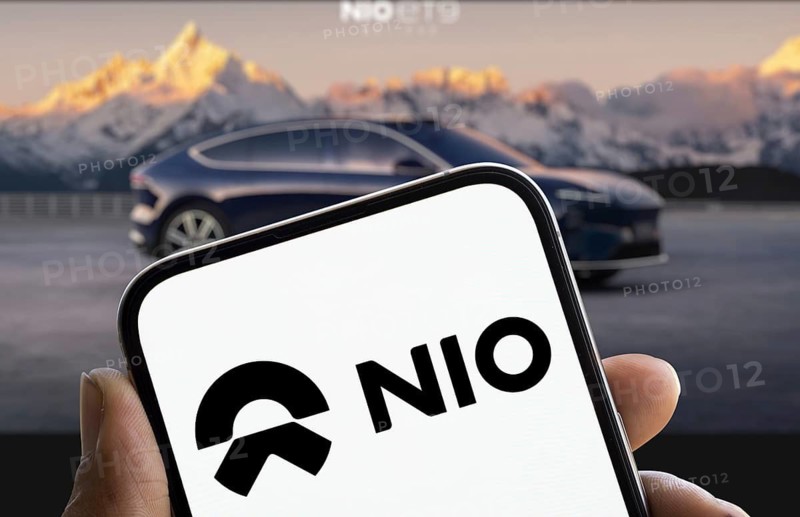 Nio logo is displayed on smartphone. Nio Inc is a Chinese multinational automobile manufacturer company
