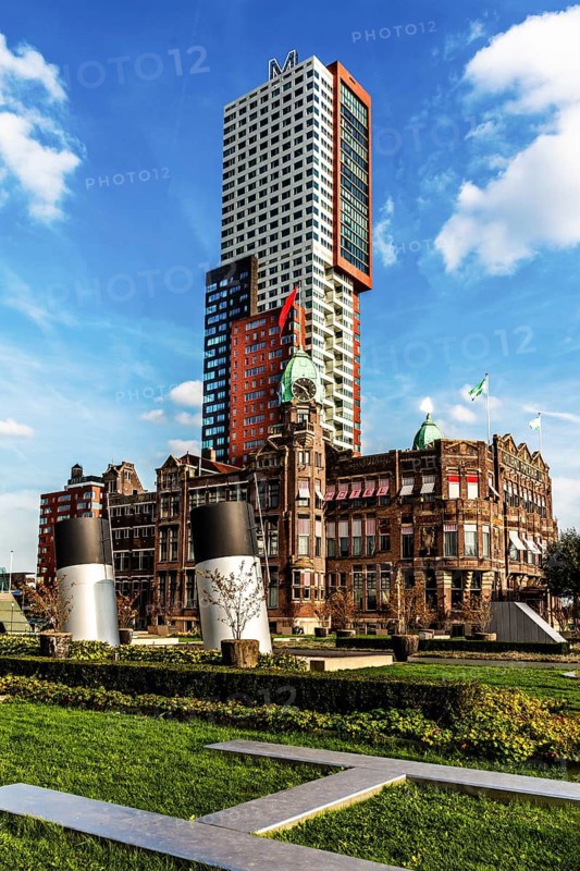 Hotel New York, historic art nouveau building on the Kop van Zuid, former headquarters of the Holland America Line, thousands of emigrants once left this place for North America, modern architecture in the city panorama, Rotterdam, Netherlands