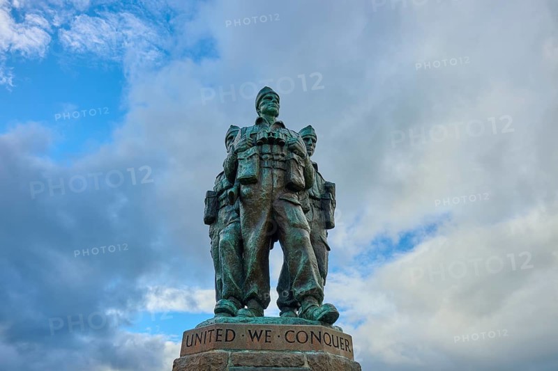Bronze statue of soldiers surrounded by clouds with the phrase 'United We Conquer', Commando Memorial, Spean Bridge, Scotland, United Kingdom, Great Britain