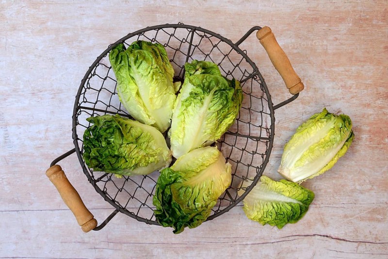 Baby salad, salad in basket with knife