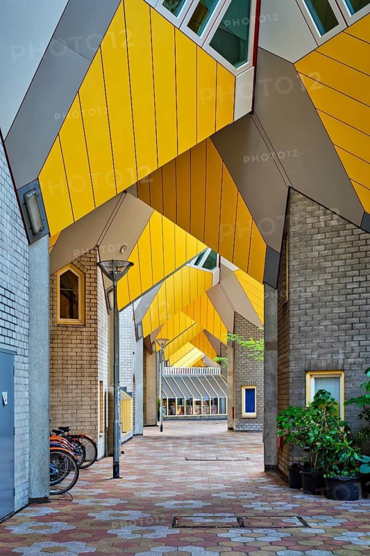 ROTTERDAM, NETHERLANDS, MAY 11, 2017: Cube houses, innovative cube-shaped houses designed by architect Piet Blom with idea to optimize space in Rotterdam, Netherlands now became a tourist attraction