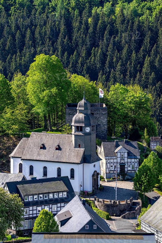 The village of Nordenau, district of Schmallenberg, in the Hochsauerland district, St Hubertus Church, North Rhine-Westphalia, Germany