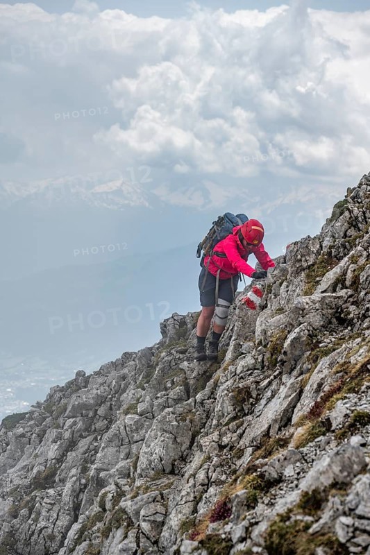 Mountaineer with helmet, ascent to the Ackerlspitze, Wilder Kaiser, Kaiser Mountains, Tyrol, Austria