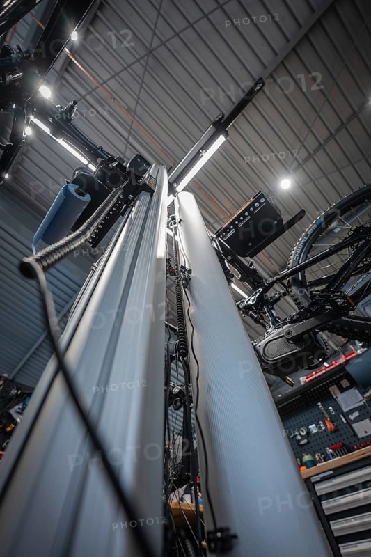 Modern workshop with bicycle frame and lighting seen from below, Waldbike Manufaktur, bicycle workshop, Calw, district of Calw, Black Forest, Germany