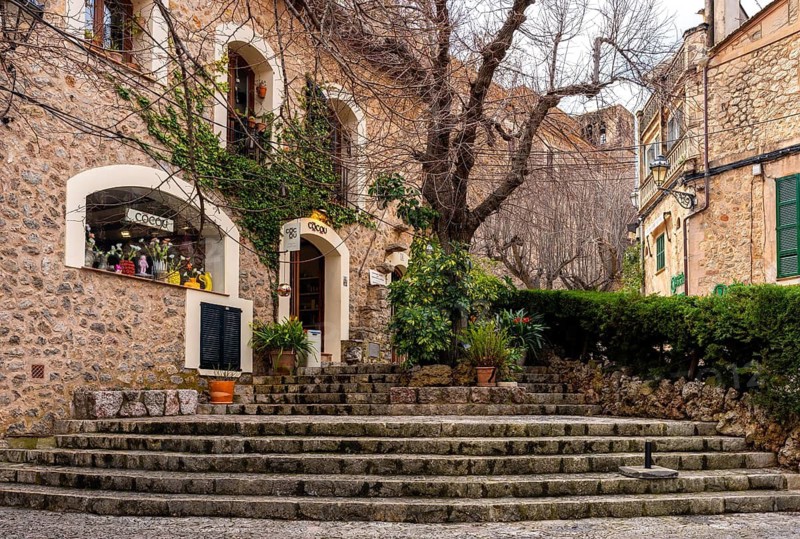 Urban architecture and house facades in the picturesque mountain village of Valdemossa, Majorca, Balearic Islands, Spain