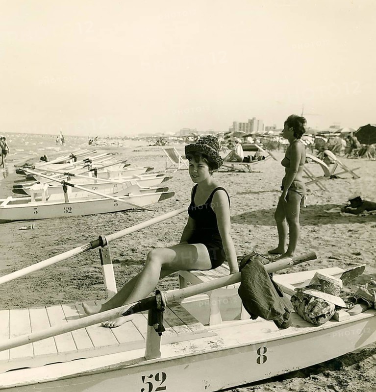Historical photo summer 1961, tourists, beach, Rimini, Italy