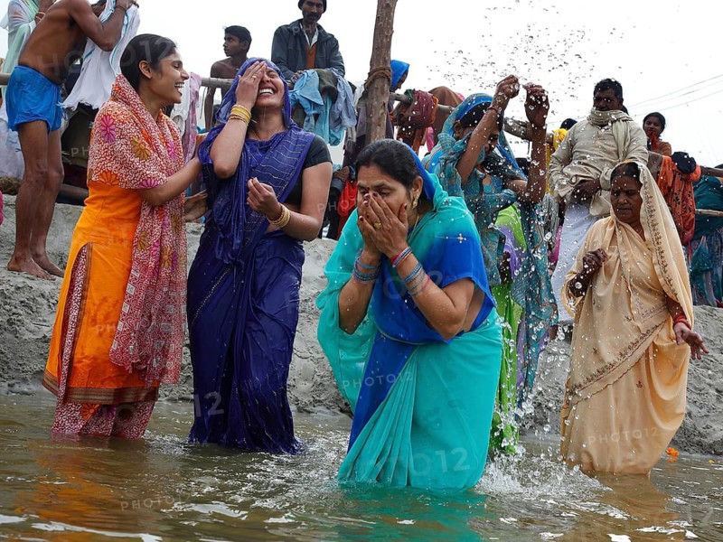 Allahabad, India, 20.01.10 - Hindus meet at Magh Mela in Allahabad to take a holy bath at the Sangam at the confluence of the Ganges, Yamuna and Saraswati rivers. Devotees take holy dip at Sangam. Magh Mela is an annual Hindu ritual hero on the banks of Sangam.The Mela is also known as the mini Kumbh Mela. It is held in the Hindu month of Magh