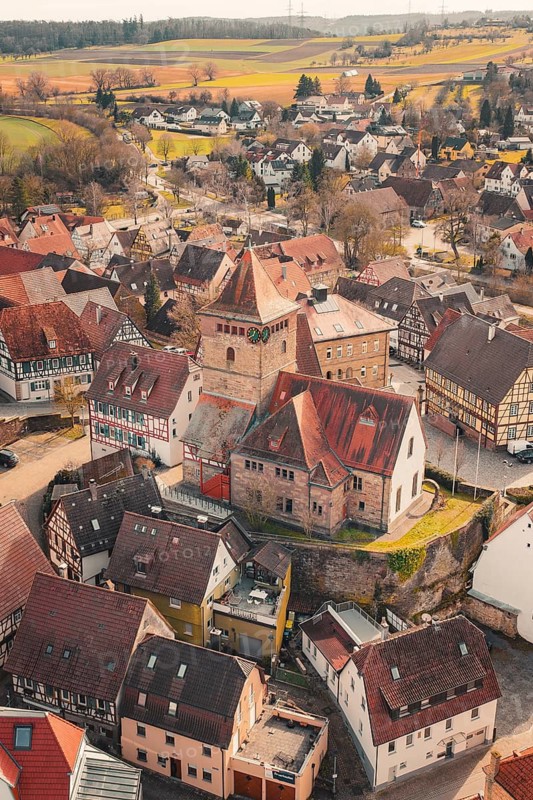 Historic old town with half-timbered houses and a church in the center from a bird's eye view, Ötisheim, Enzkreis, Germany